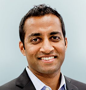 Headshot of Jacob Chacko, MD President, Chief Executive Officer and Board Member on light sage background