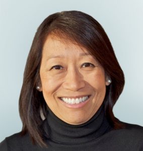 Headshot of Enda Chow Maneval, PHD Senior Vice President, Clinical Development on light sage background